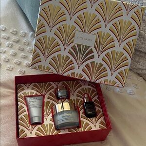 Estee Lauder Skincare Collection with Red Accents